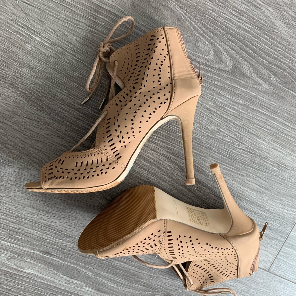 Open toe heels with cut out design